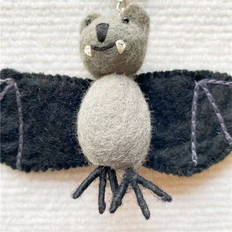 Charming Handmade Felt Bat Ornament with Cute Vampire Smile