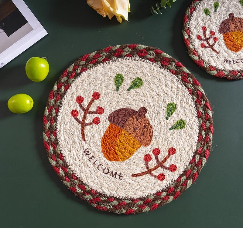 Handmade Christmas Jute Coasters —— A single acorn nestled in jute