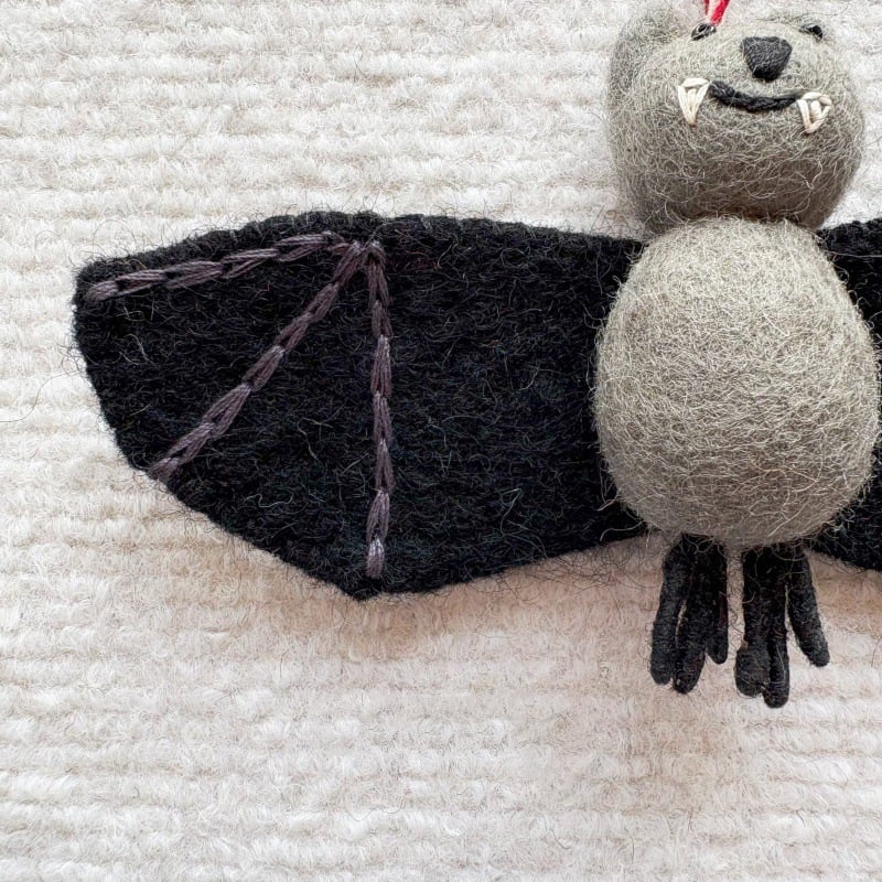 Charming Handmade Felt Bat Ornament with Cute Vampire Smile 