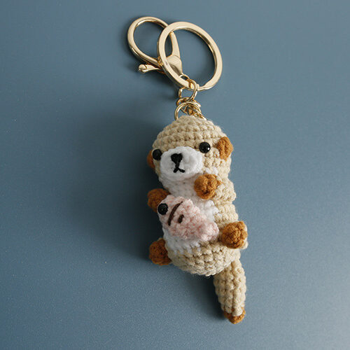 Handmade Crochet Otter Keychain with Tiny Fish Charm and Gold Hardware – Cute Yarn Animal Pendant for Bags and Keys