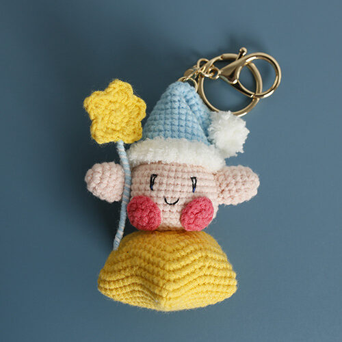 Handmade Starry-Eyed Cutie Keychain Dreamy Star Charm with Pastel Yarn Texture and Gold Tone Hardware - Perfect Gift for Dreamers