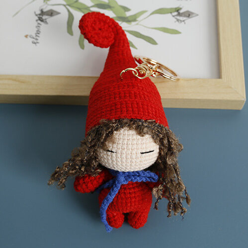 Handmade Crochet Witch Doll – Artisan Yarn Sculpture with Red Hat and Flowing Curls