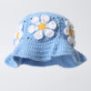 white daisy with blue background