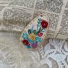 Hand-embroidered hairpin apricot