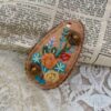 Hand-embroidered hairpin orange