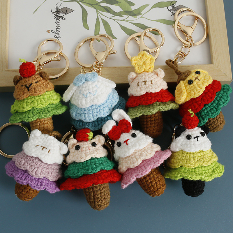 Charming Handmade Crochet Christmas Tree Animal Keychains Set of 8 Unique Designs with Cute Animal Faces and Festive Colors