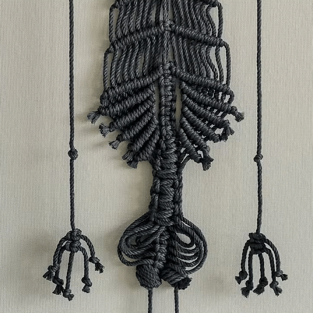handmade macrame skeleton wall hanging